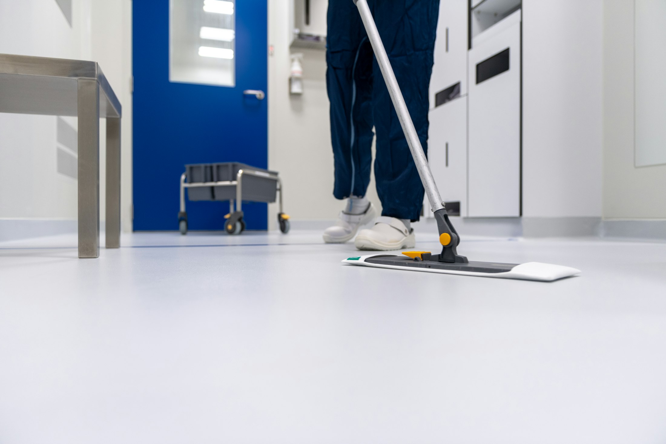 A floor being cleaned to a mirror finish